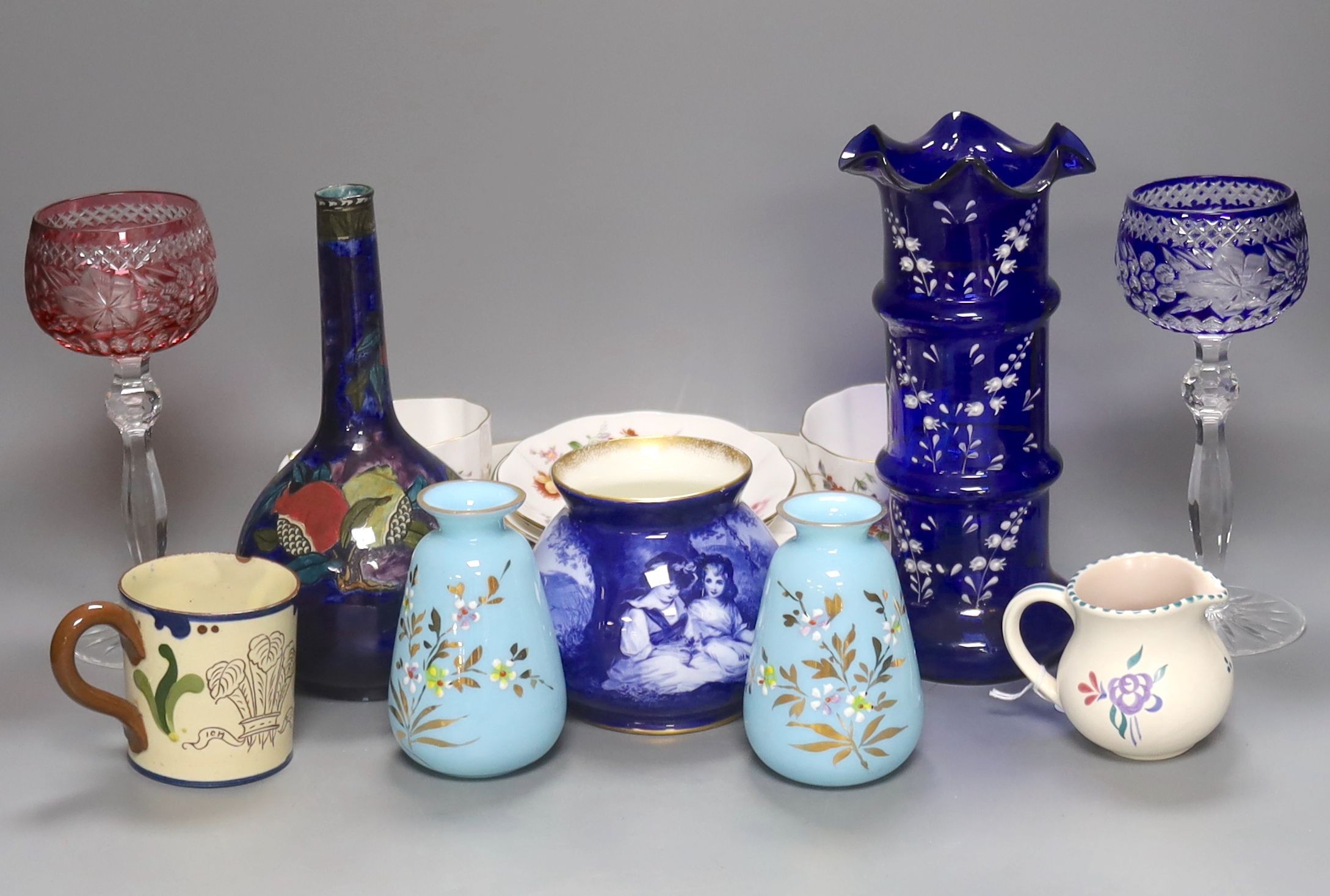 A quantity of mixed ceramics and glass including hock glasses, Doulton, Worcester, derby etc, tallest, vase blue glass vase23 cms high.
